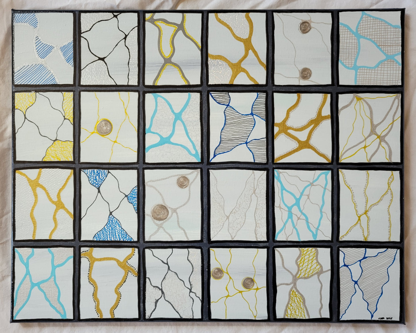 The background of the canvas is a blend of whites and dark winter blues. 24 panels are bordered in black and a slate gray. Each panel features a different snapshot of neurographic lines in silver or black or gray or gold or blue. Each panel has a different concept to highlight the segments created by the neurographic lines. Some panels feature simple zen line designs, some feature silver crackle foil, some feature gold or silver alkyd oil.