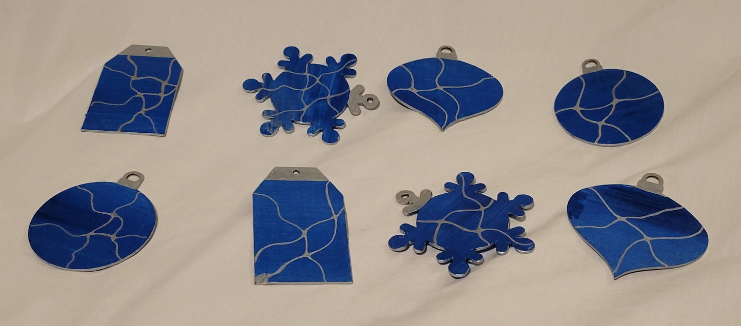 All eight ornaments (2 sets of 4) on a white background. They have unique patterning of the silver and blue background as well as silver neurographic line art.