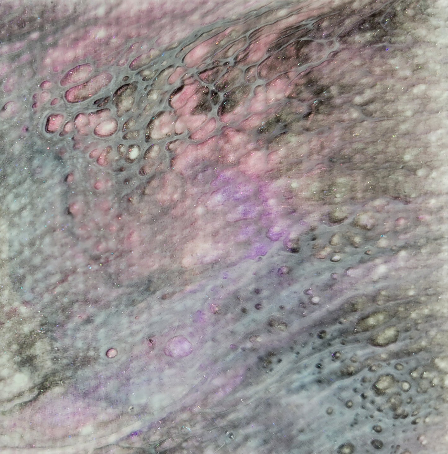 Close-up detail of one of the Carina Nebula II canvases, showing gray lacing over pink, purple, and black fluid acrylic patterns.