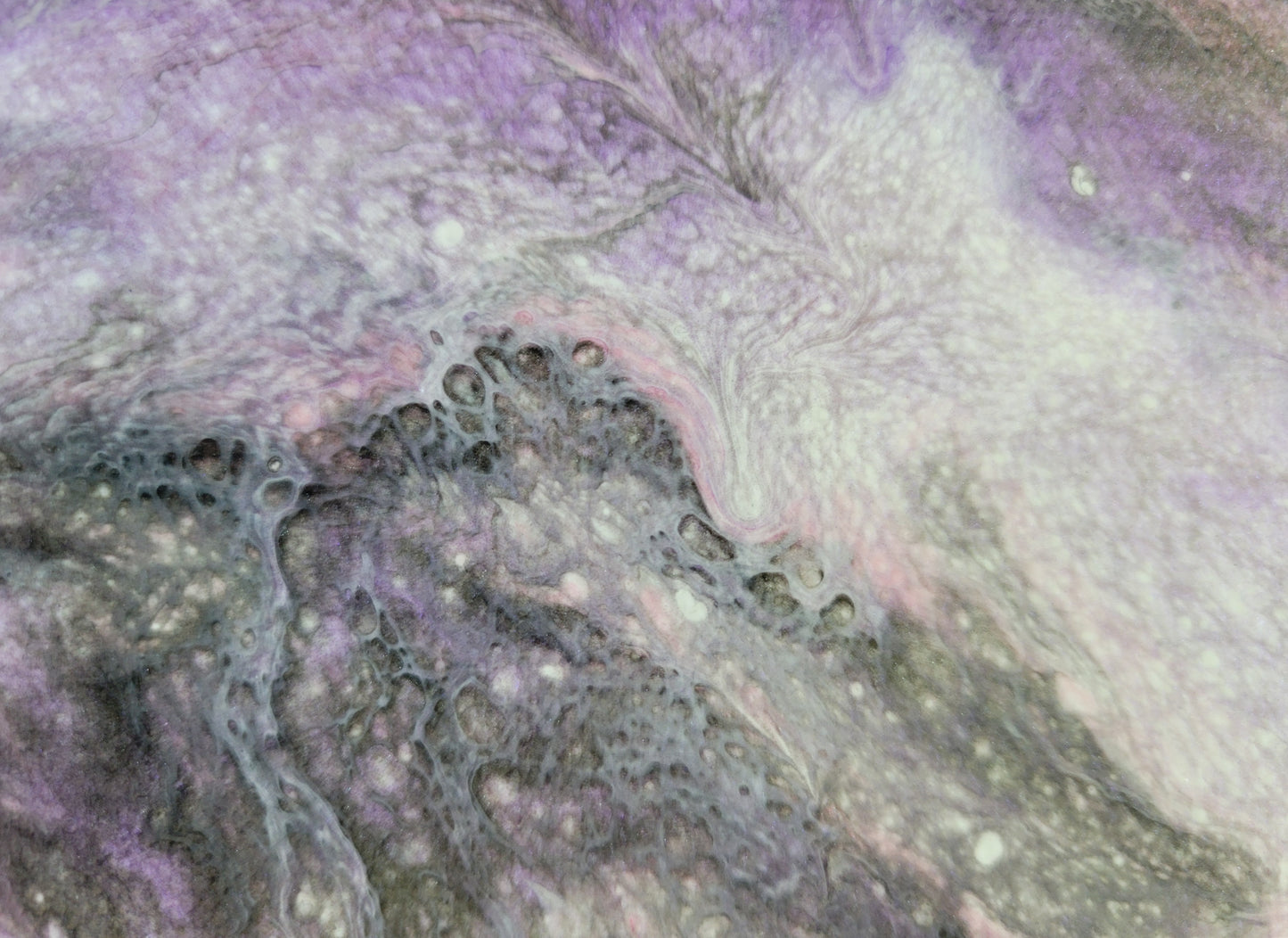 Close-up detail of one Carina Nebula I canvases, showing gray lacing over black, purple, white and pink, shadowed in such a way that the lacing looks like it's hovering over the other colors.