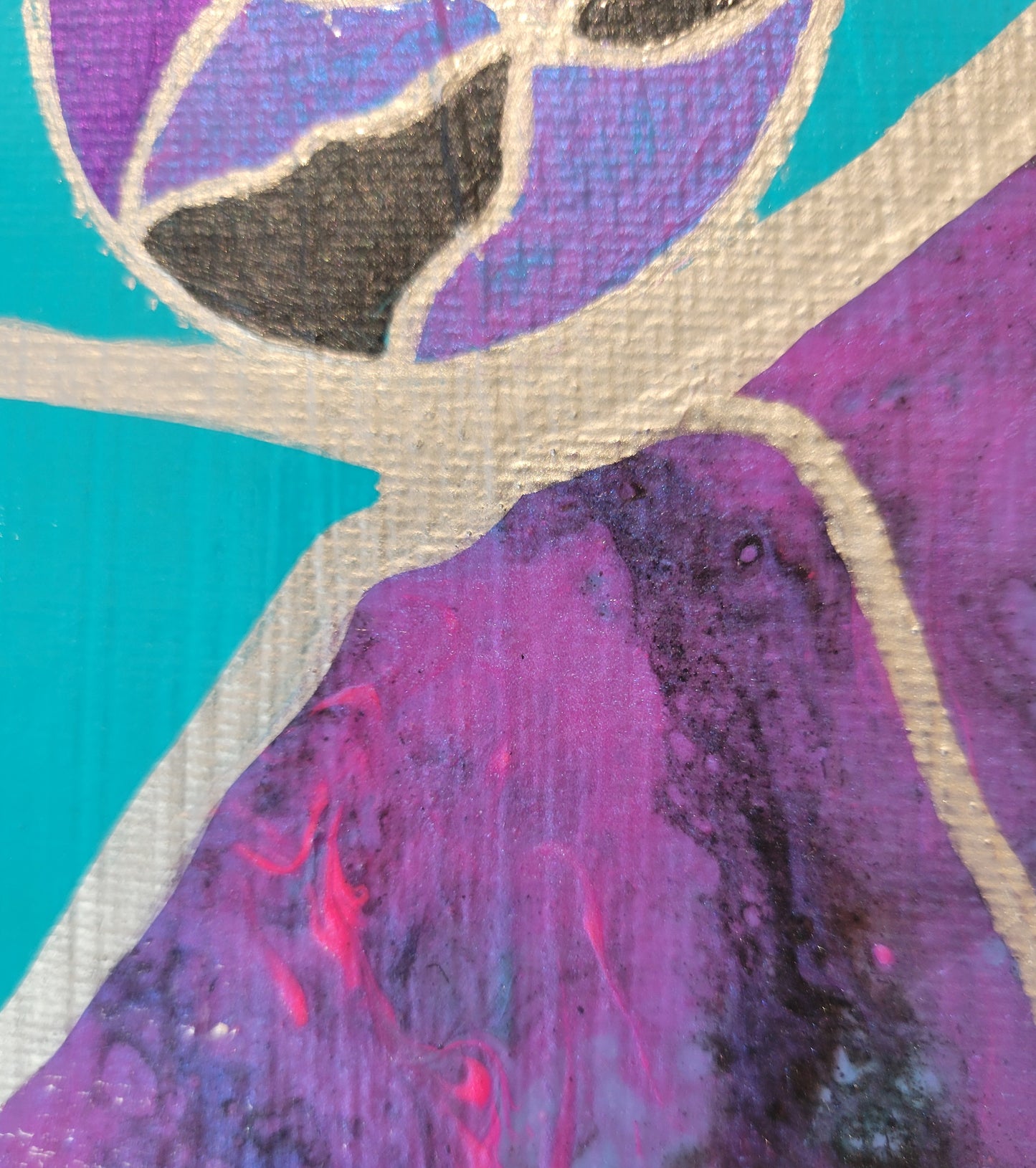 Detail of an edge of the acrylic pour, highlighting the pinks, purples, and blue-blacks along with the silver outline and threading lines. Part of one of the multi-colored balls in black, purple and pink can be seen.