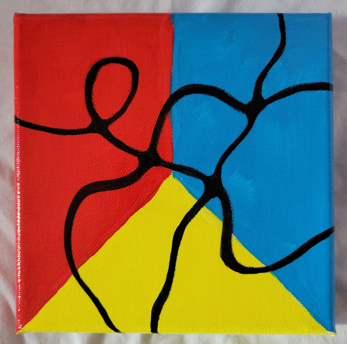 Black lines curl, curve, twist, and intersect against a meeting of the primary in their brightest shades.