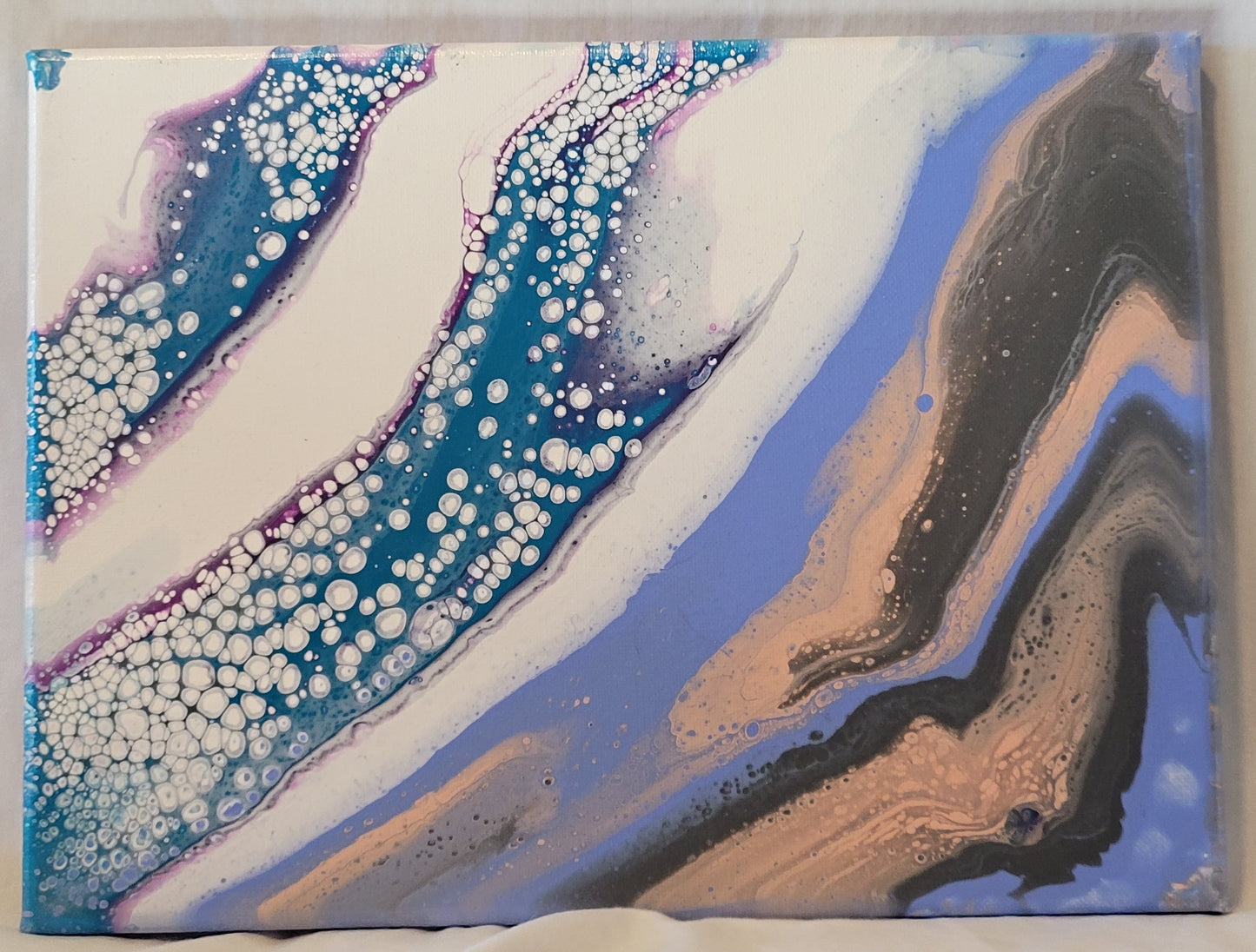 Two-toned acrylic pour in white and blue-violet. On the white side, streaks of teal with violet undertones stretch on a diagonal, with white bubbles intruding through the colors. On the blue-violet side, streaks of light pink and gray bend around each other slightly, bubbling around each other.