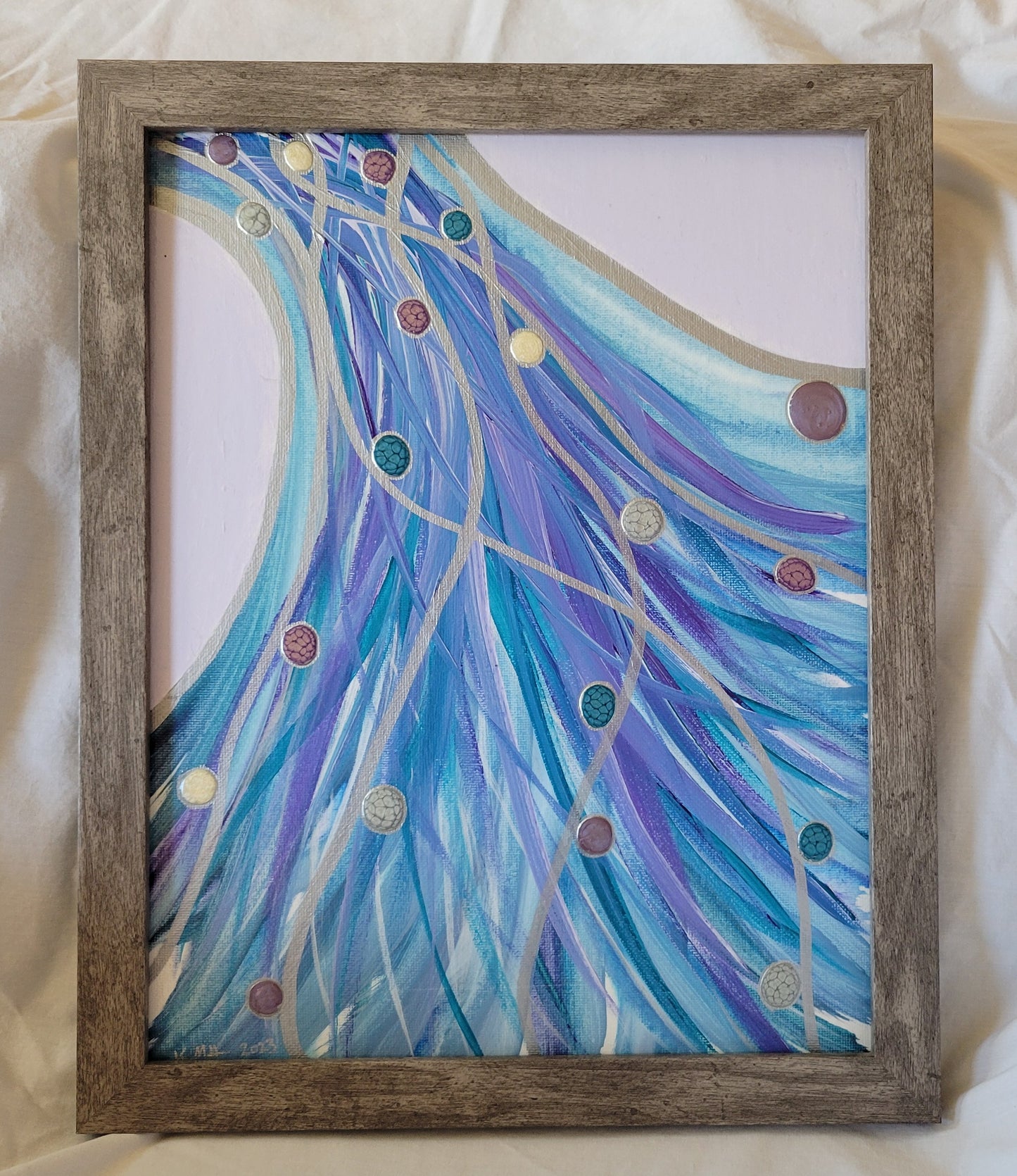 A gray wood-grain framed 11x14 canvas panel featuring an arcing and weaving diagonal grouping of purple, teal, white, blue, and silver lines with drops of alkyd oil traveling along the silver lines throughout. The grouping of lines is bordered in silver against a lilac background.