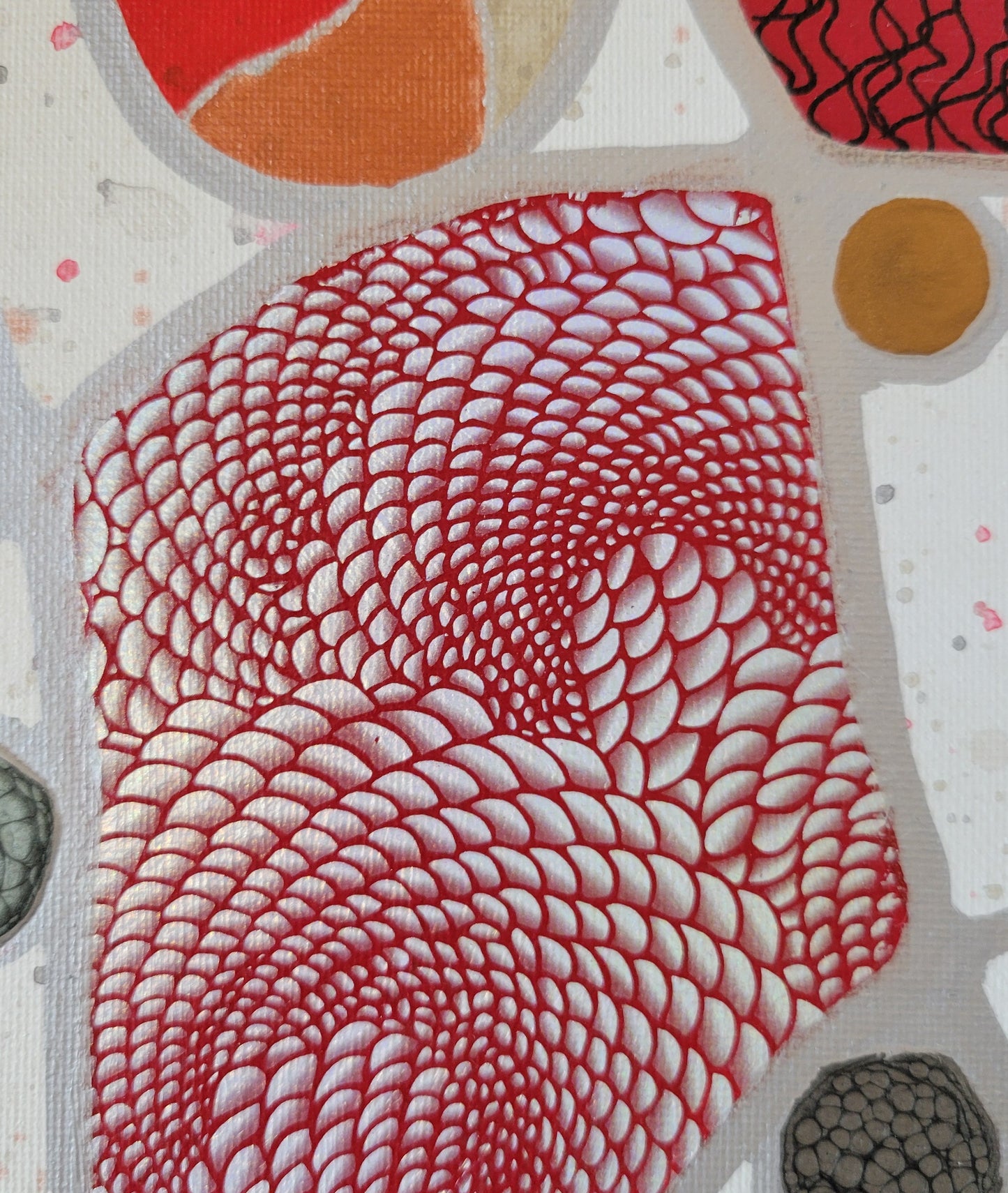 Close-up detail of the silver psychedelic foil over the red paint.