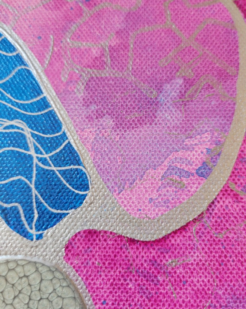 Close-up of background detail that highlights the silver abstract pattern over the pink gradations with splotches of blue. The cilia-like white lines in the amoeba shape is clear.