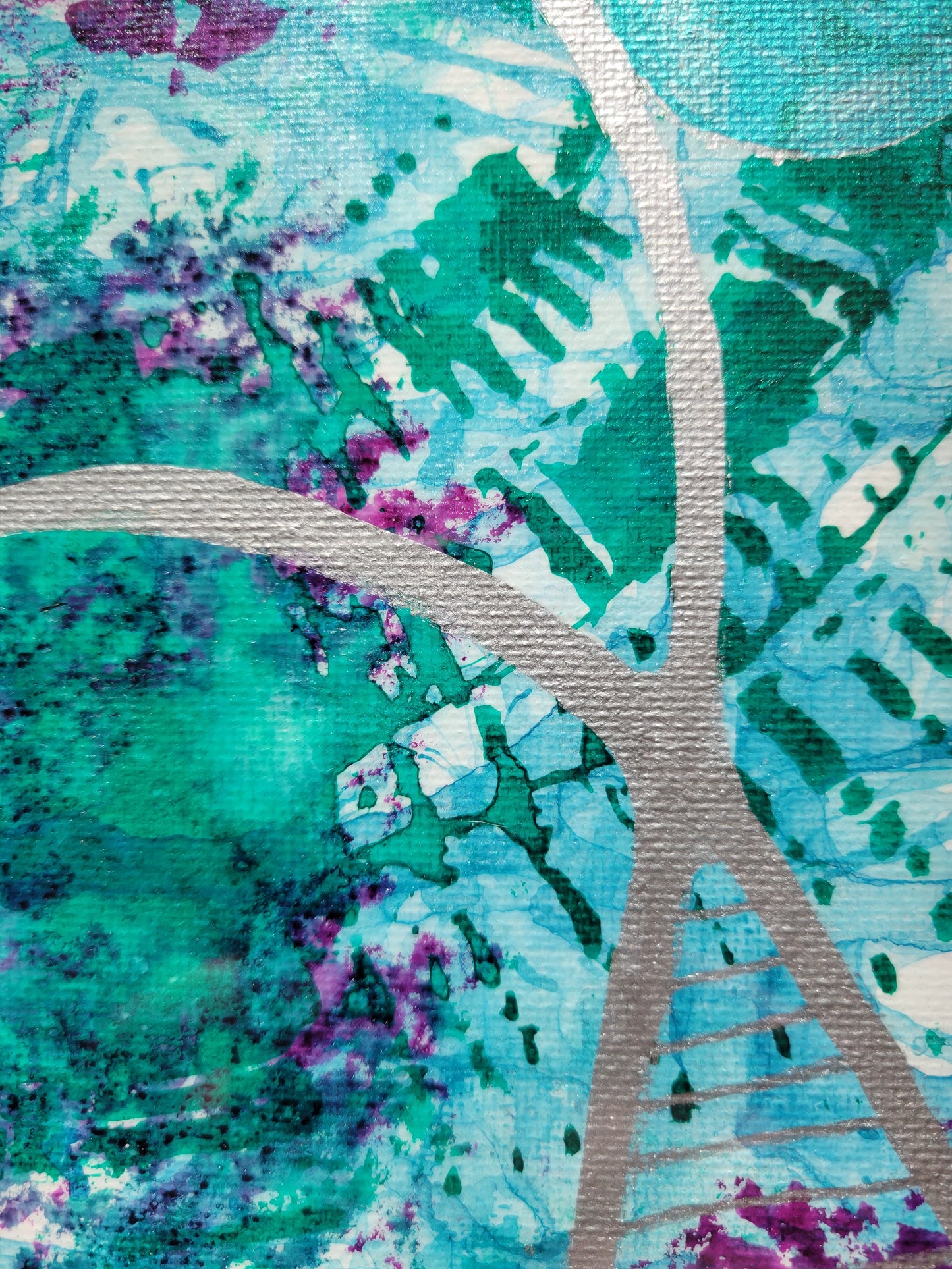 Closeup detail highlighting the green ink staining and lining against the blue ink spills and smaller purple splotches. Over it all is an intersection of silver lines and the edge of a turquoise sphere.
