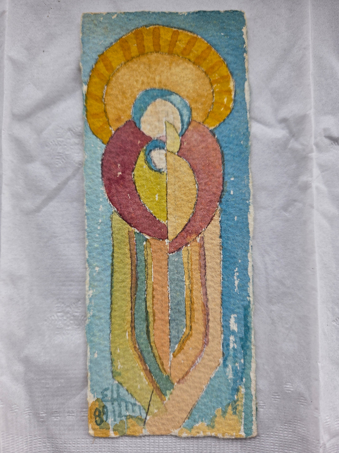 A small bookmark with abstract watercolor of Mary with her son Jesus in bright colors.