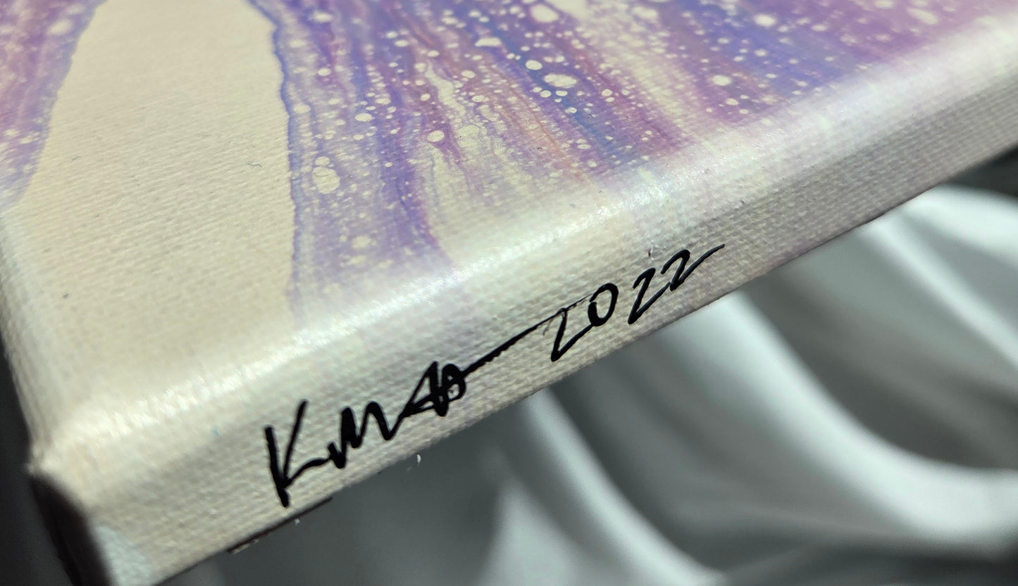 Close-up details of the artist's initials and year of completion (KMH 2022) in black on the beige-painted edge of the canvas.
